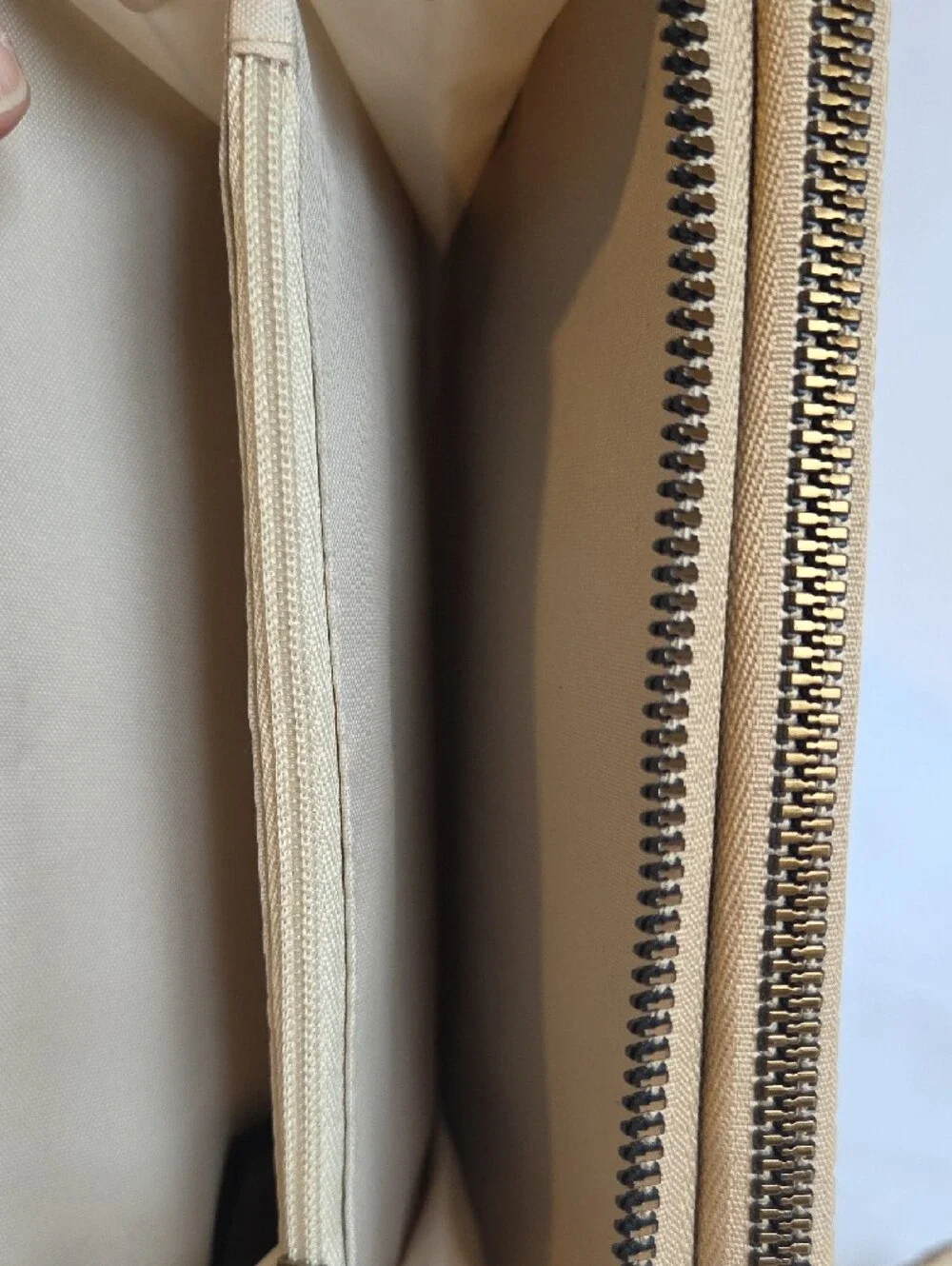Safe Keeper Beige Textured Woven Zip Around Wristlet Wallet.